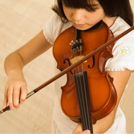 Child playing violin